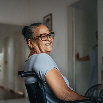 Lady in wheelchair in her lounge